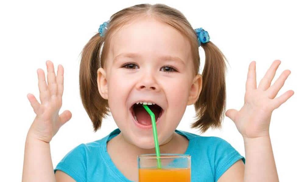 Girl Drinking Vitamins